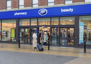 Boots pharmacy chemist shop, High Street, city of Lincoln, Lincolnshire, England, UK