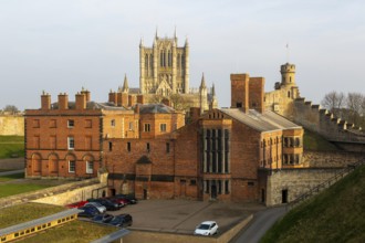 Cathedral and Victorian prison from medieval wall, inside Lincoln Castle, city of Lincoln,