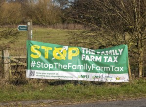 Stop the Family Farm Tax protest banner by roadside, Suffolk, England, UK - campaign against