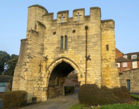 Pottergate medieval stone archway entrance to cathedral area in city of Lincoln, Lincolnshire,