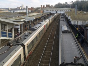 Looking down from above at Greater Anglia trains at platforms of Ipswich railway station, Suffolk,