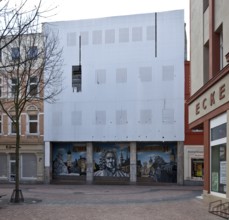 Köthen Anhalt Schalaunische Straße vacant commercial building with damaged façade cladding 74581