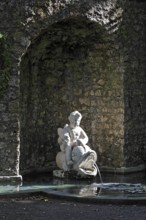 Fountain with cherub and fish