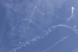 Airshow, glider contrails against blue sky, Montreal, Province of Quebec, Canada, North America