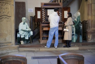 The Lutheran Church of St Thomas, Église Saint Thomas de Strasbourg, Alsace, Visitors look at an