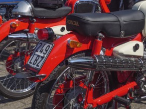 Two red Honda motorbikes with dual exhaust and a classic style, Appelhülsen, münsterland, germany