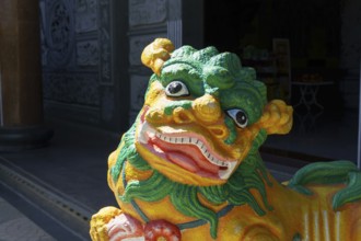 Colourful lion sculpture in temple, radiating energy and artistry, penang, malaysia