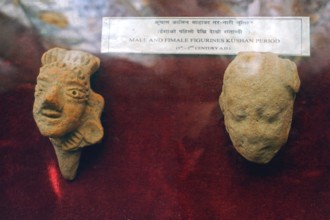 Male & female figurines of Kushan period, excavated artifacts in museum, UNESCO World Heritage,