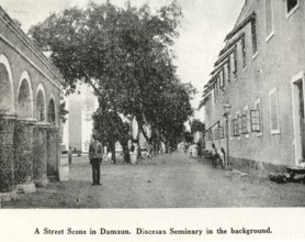 Catholic community street scene in Damaun Diocesan Seminary in background, Daman UT, India, Asia