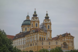 Impressive baroque church with decorative copper roofs and sky, donau, austria