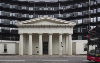 London, historicised Doric temple portico against a modern backdrop