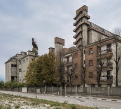 Porto Marghera near Venice, industrial harbour, malthouse and silo, residential building in front