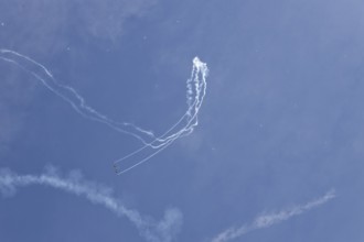 Airshow, glider contrails against blue sky, Montreal, Province of Quebec, Canada, North America