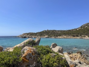 View of coast with rocks and clear blue water, cagliari, sardinia, italy