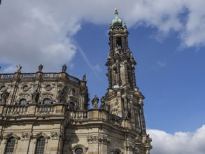 Gothic church with imposing tower under a blue sky, dresden, saxony, germany