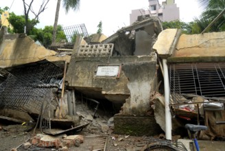 Twenty-five years old building collapsed after it developed cracks in between two buildings Mulund