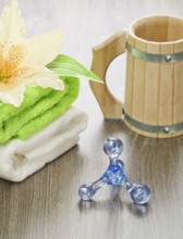 Accessories for bathing on wooden background