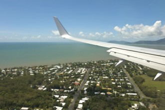 Aerial view of airplane approaching Cairns city, Queensland, Australia, Oceania