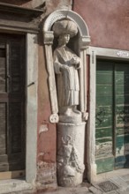 Italy Venice Fondamenta dei Mori -83 Sculpture 13th century of an oriental spice merchant to the