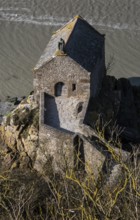 Mont-Saint-Michel, monastery hill, St-Aubert chapel 12th century at the foot of the abbey rock