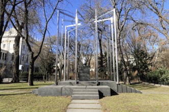 Modern sculpture in a park in Vienna, surrounded by winter trees, Vienna, Austria, Europe