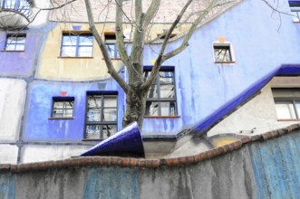 Detail of the coloured façade of the Hundertwasser House, Hundertwasser House, residential