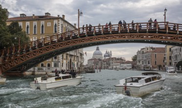 Venice, Accademia Bridge over the Grand Canal, behind the church of Santa Maria della Salute, St.,