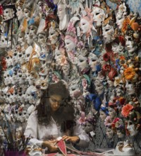 Italy Venice Mask maker -231 in her workshop surrounded by her products