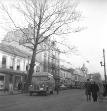 Trondheim Norway 1949. A busy street in the city with people walking and a bus leaving the bus stop