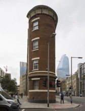 London, Southwark Road narrow brick head building with semi-circular end