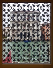 Venice, Ca'Grande (Palazzo Corner) on the Grand Canal seen through a barred window of the Peggy