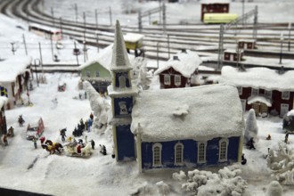 Snow-covered church in Miniatur Wunderland Hamburg, Germany, Europe