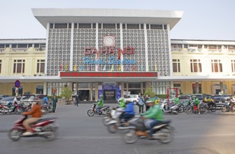 Moped rider at Hanoi railway station, Vietnam, Asia