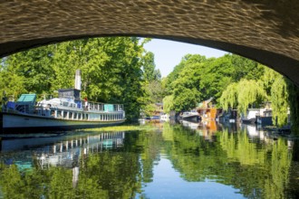 Berlin, Germany, June 2022: View on houseboat on the Spree river in Berlin in Tiergarten, Europe