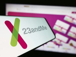 Stuttgart, Germany, 11-03-2023: Mobile phone with logo of American biotechnology company 23andMe