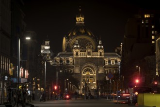 Antwerp, Belgium, March 21st 2024: Night view on De Keyserlei in Antwerp with NMBS Central Railway