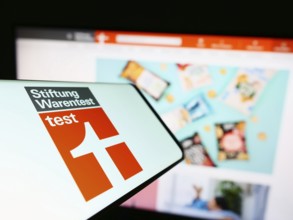 Stuttgart, Germany, 03-10-2023: Cellphone with logo of German consumer oragnization Stiftung