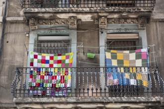 Colourful laundry on a washing line in the Barcelonata district of Barcelona, Spain, Europe