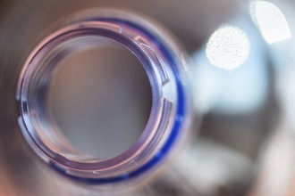 Close-up of the opening of a plastic bottle