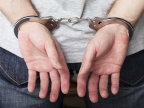Police law steel handcuffs arrest crime human hand