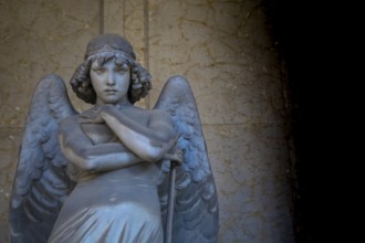 GENOA, ITALY - June 2020: antique statue of angel (beginning 1900) (marble) in a Christian Catholic