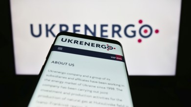 Stuttgart, Germany, 10-27-2023: Mobile phone with webpage of Ukrainian national power company