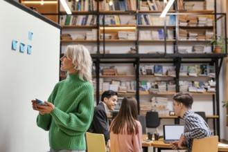 Woman writing business idea