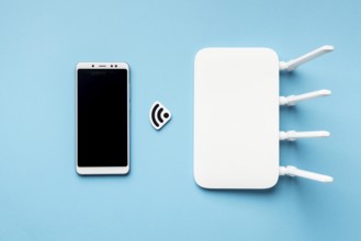 Top view wi fi router with smartphone. High resolution photo