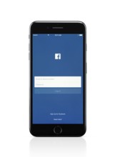 Apple iPhone 7 Plus with Facebook login screen on its display isolated on white background with