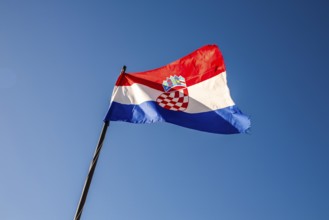 Flag of Croatia waving in the wind, Dubrovnik, Dalmatia, Croatia, Europe