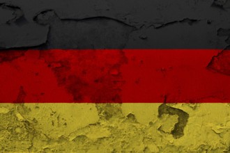 Germany Flag painted on the cracked grunge concrete wall