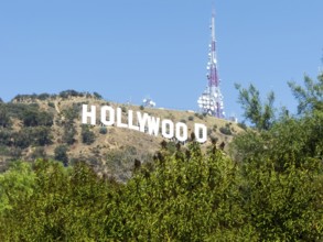 The Hollywood Sign (formerly the Hollywoodland Sign) is a landmark and American cultural icon