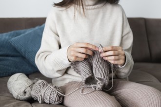Woman home knitting close up 8