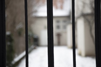 Grille with building in the background, Freiburg im Breisgau, Baden-Württemberg, Germany, Europe